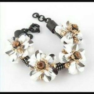 J CREW BLACK WHITE AND SILVER FLOWER CORD BRACELET